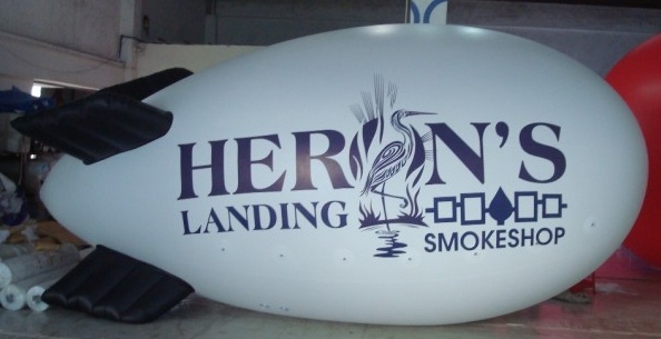 White Advertising Herns Landing Smokeshop Blimp