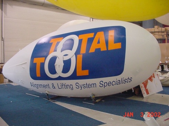 White Blue Advertising Total Tool Blimp