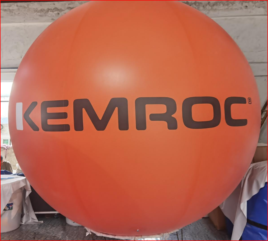 Orange Branded Helium Sphere for Construction Trade Show
